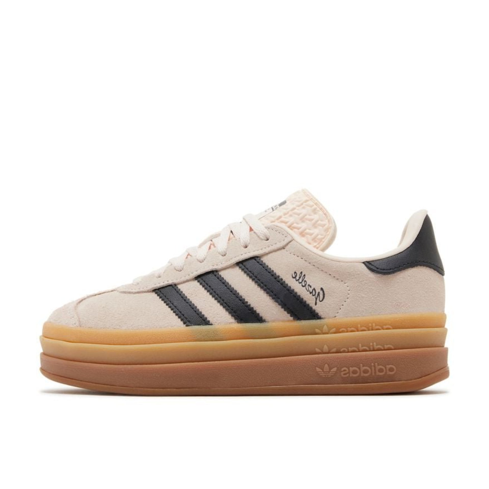 These Adidas Gazelle Bold Shoes feature a cream white Beige suede and black stripes with a New Gazelle printed on the suede in a cursive font.