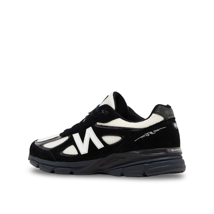 New Balance 990 v4 "Black Blaze" in black and white suede and plastic. The shoe is a collaboration with Joe Freshgoods