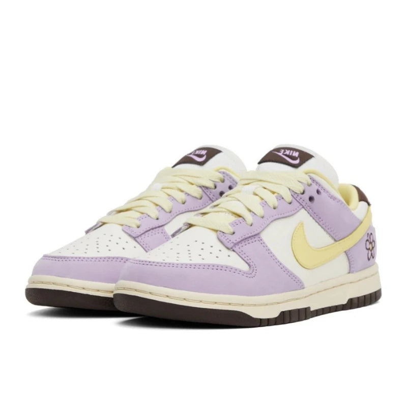 Second image of the Nike SB Dunk Purple Lillac, showing the front side with white breathable toebox and purple leather.