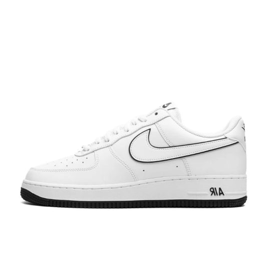 Air Force 1 Low Classic White and Black product image. The shoe has a an all white upper leather and the sole has a black highlighting as well as the Swoosh.