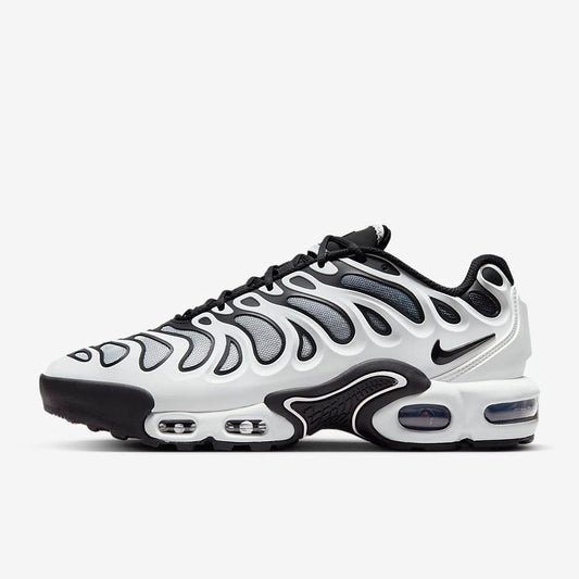 Side view of Nike Air Max Plus Drift in Black and White – Showcasing the sleek mesh upper and TPU overlays.