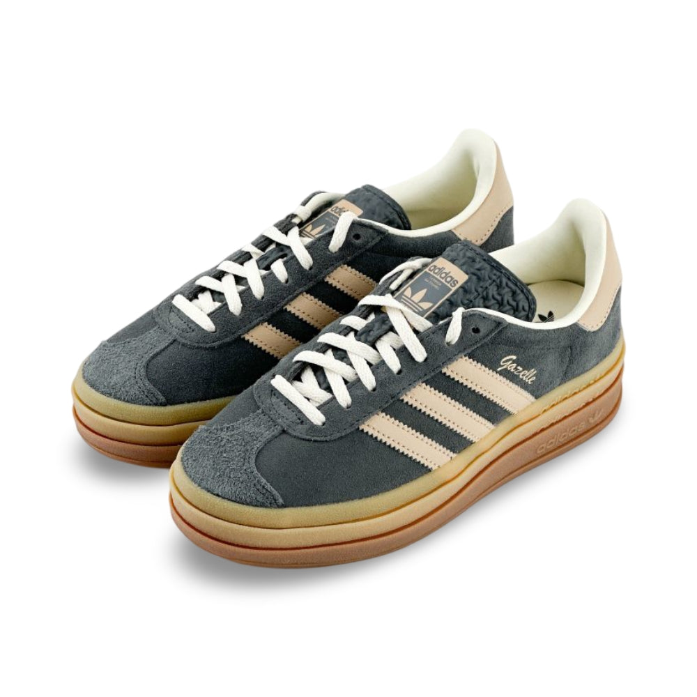 Upper image of the Adidas Gazelle Bold Grey Magic Beige Gum for women. The Shoe that has the new Cursive 'gazelle' print