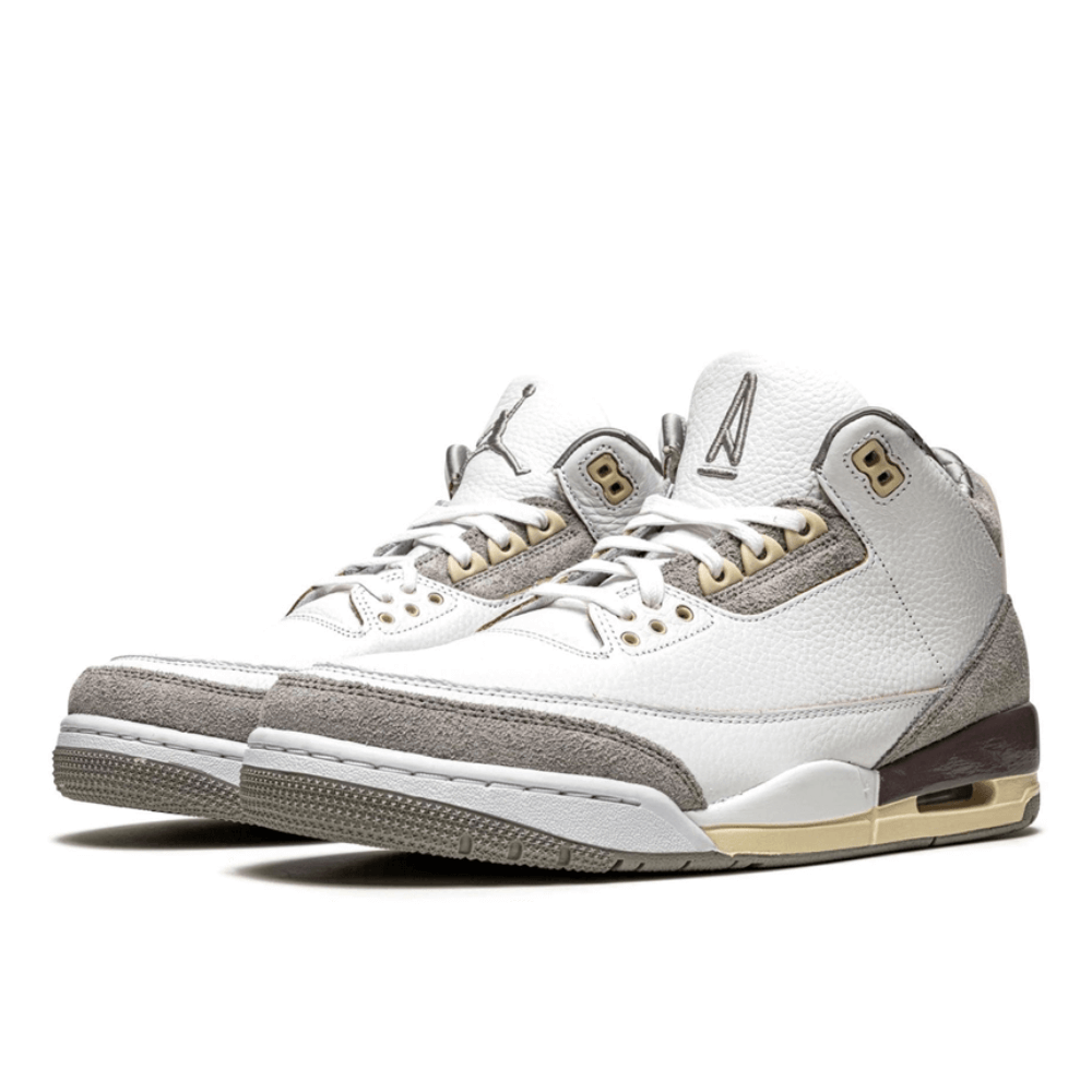 Side image of the iconic women's jordan 3 maniere showing the suede and strong white leather.