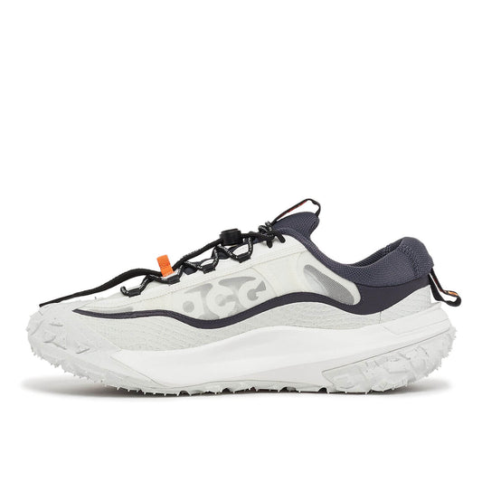 Nike ACG Mountain Fly 2 Low Gridiron product image showing the side of a pair. The shoe has a white upper complemented by black and orange detail.