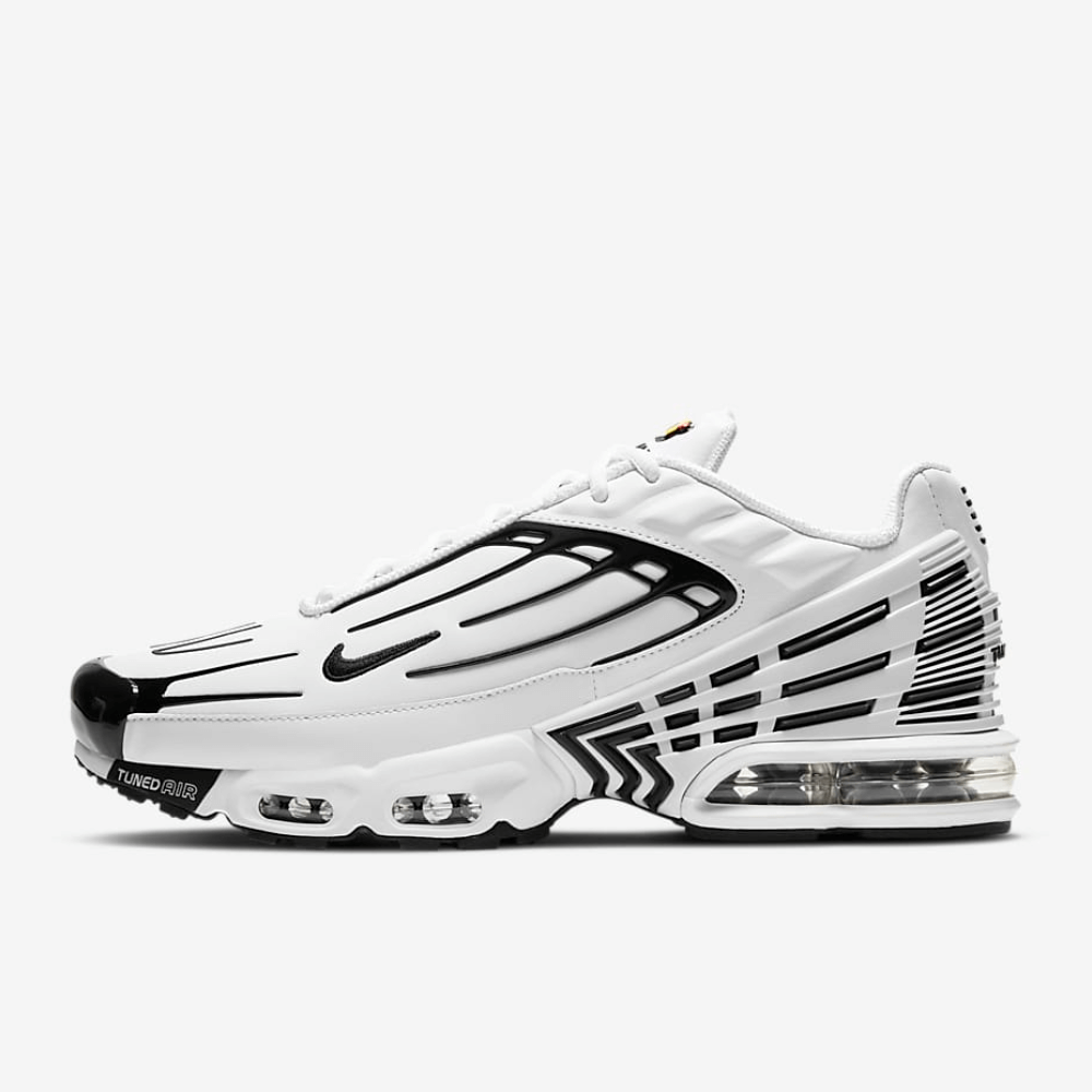 The nike air max plus 3 in white showcasing the side of the shoe with the sole printed 'tuned air'