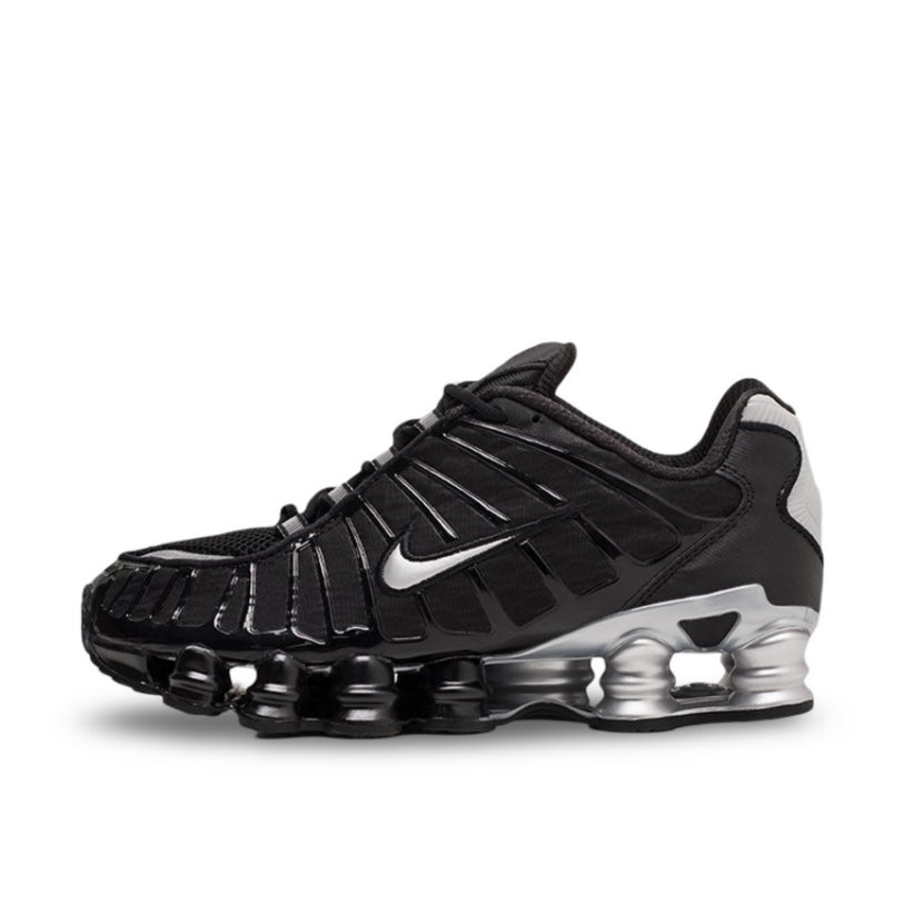 Nike Shox TL Men's Shoes in Black Silver, showcasing iconic Shox cushioning.