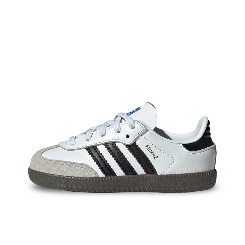 Adidas Samba OG kids in White Gum. Side image showing black stripes and white upper Leather with suede on toe box. A dark brown sole.