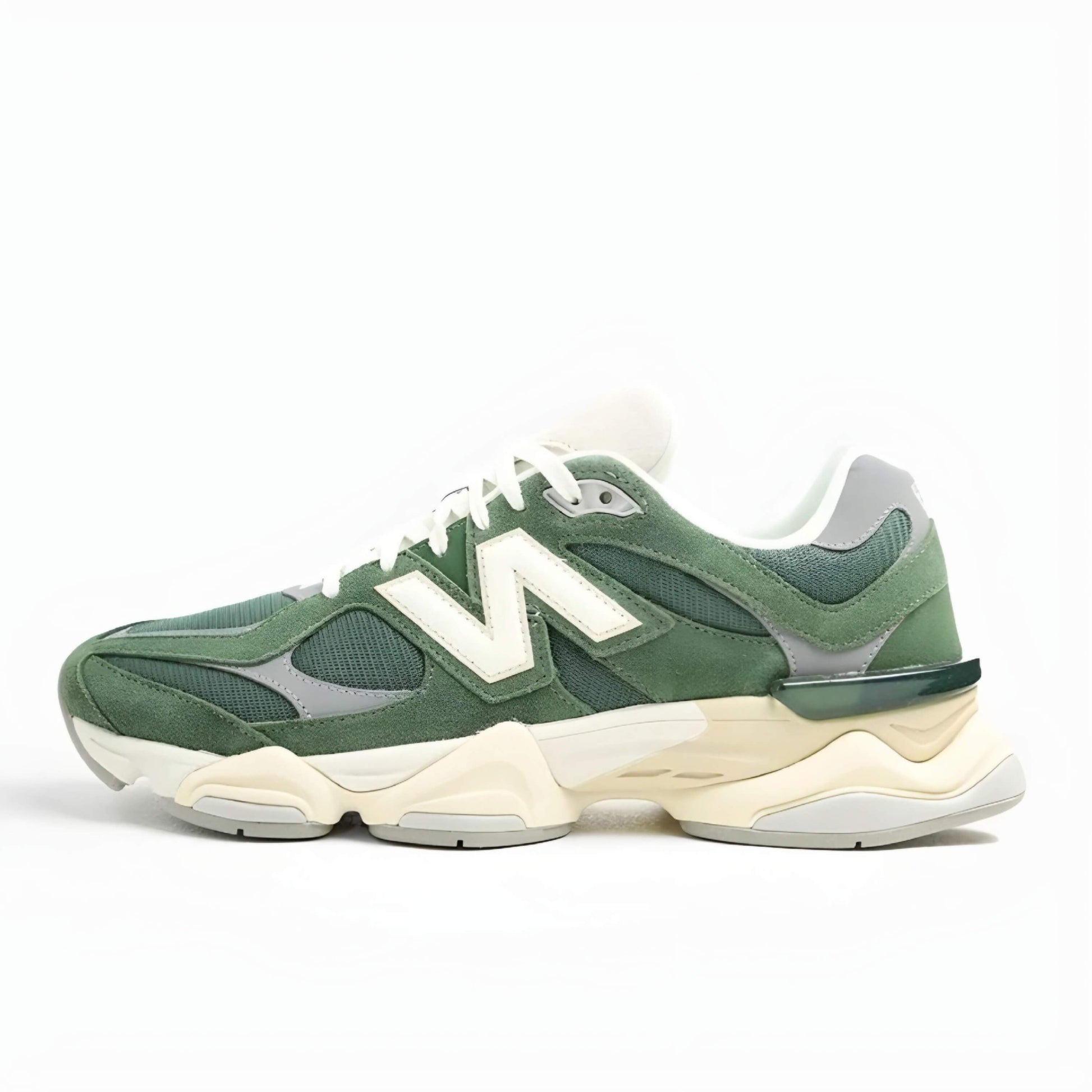 Image of the New Balance 9060 Nori color. Showcased in a grass-green and ivory-white colourway, boasting exaggerated proportions with ABZORB and SBS cushioning