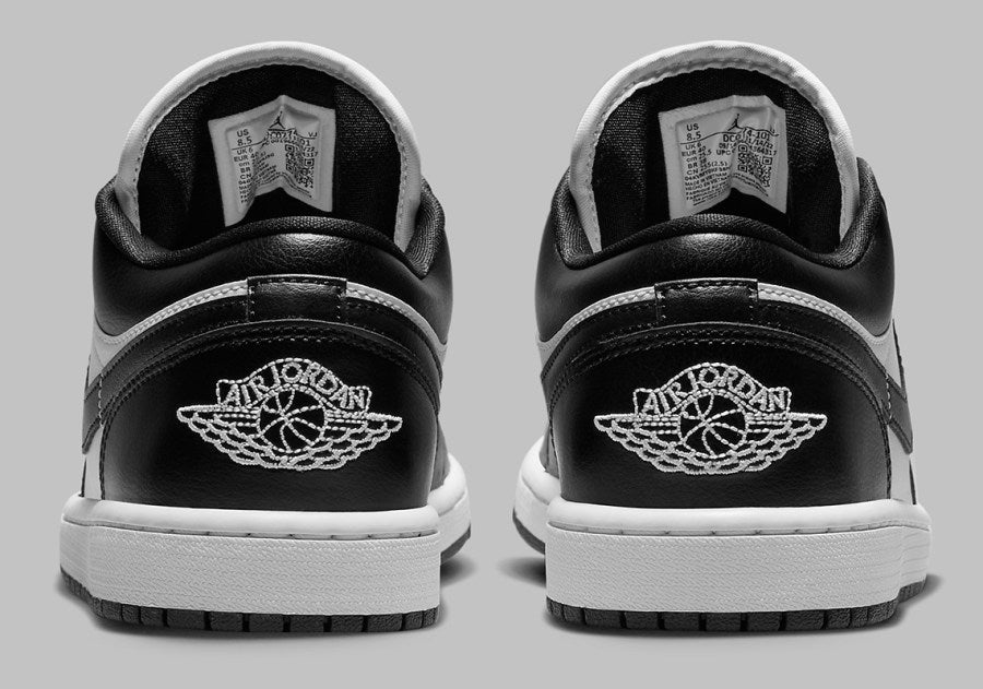 Two Jordan 1 Lows facing away from the screen. Showing the Jordan logo