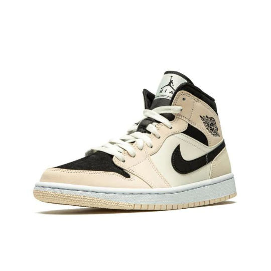 We are looking at a beige orange and black Jordan 1 sneakers.