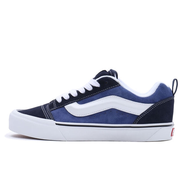 White and blue Vans Knu Skool shoes chunky in design, fluffy in texture.